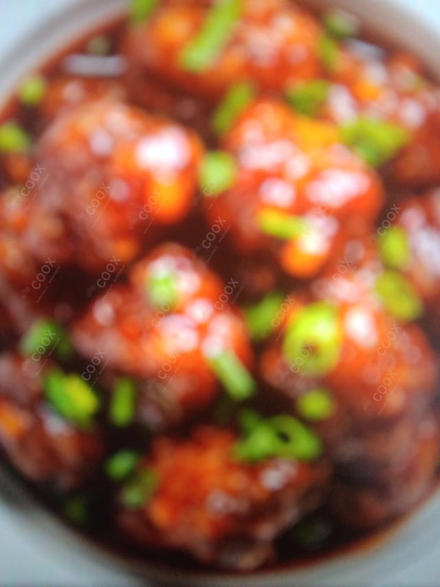 Delicious Veg Manchurian (Dry) prepared by COOX