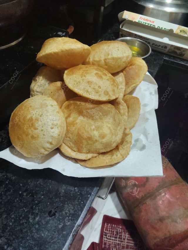 Delicious Pooris & Bedmis prepared by COOX