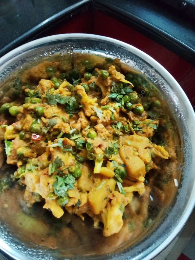 Delicious Gobhi Matar prepared by COOX