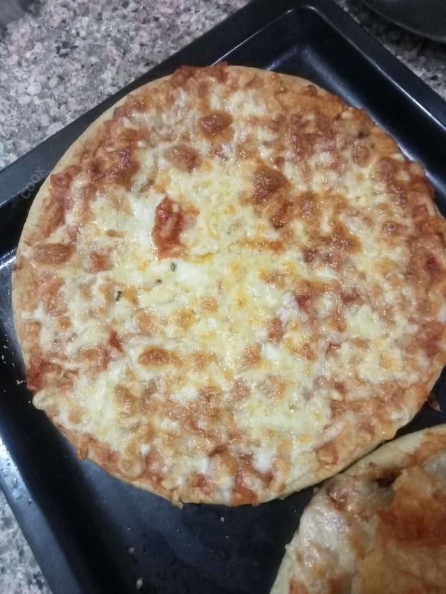 Delicious Margherita Pizza prepared by COOX