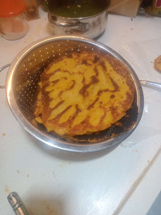 Delicious Makki ki Rotis prepared by COOX