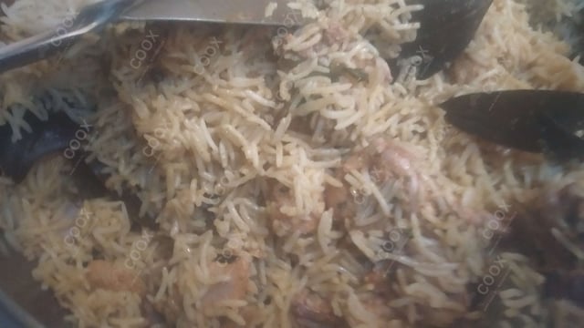 Tasty Chicken Biryani cooked by COOX chefs cooks during occasions parties events at home