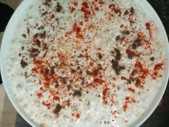 Tasty Boondi Raita cooked by COOX chefs cooks during occasions parties events at home