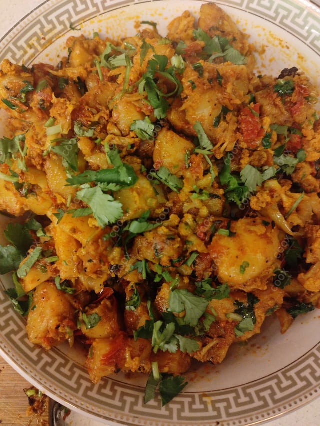 Delicious Malai Kofta (Orange Gravy) prepared by COOX