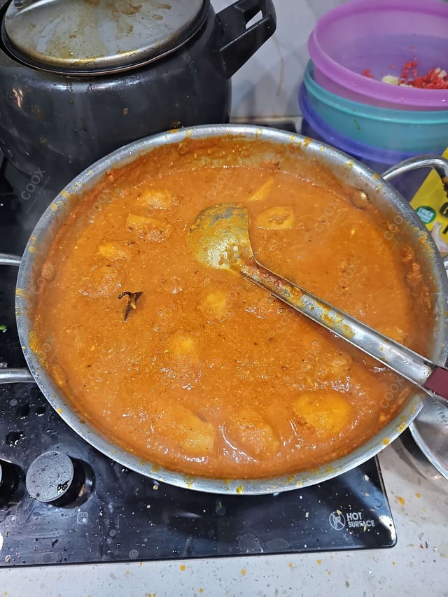 Delicious Dum Aloo prepared by COOX