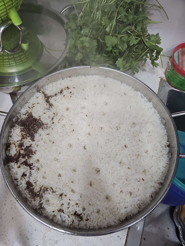 Delicious Jeera Rice prepared by COOX