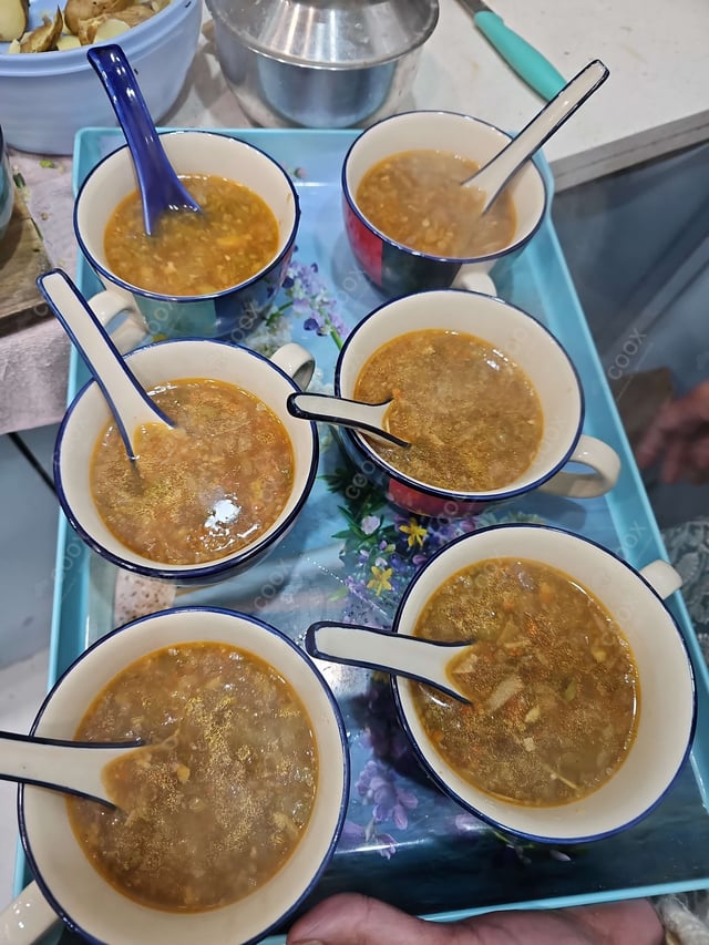 Delicious Vegetable Manchow Soup prepared by COOX