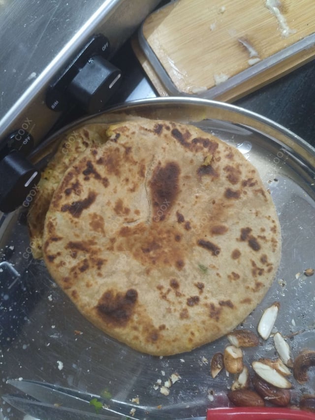 Delicious Stuffed Paranthas prepared by COOX