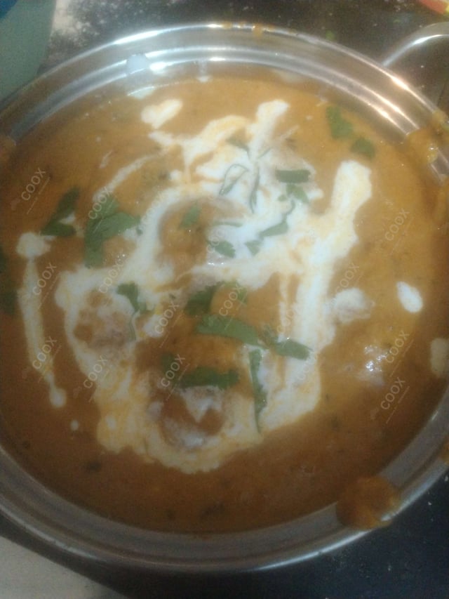 Delicious Malai Kofta (Orange Gravy) prepared by COOX