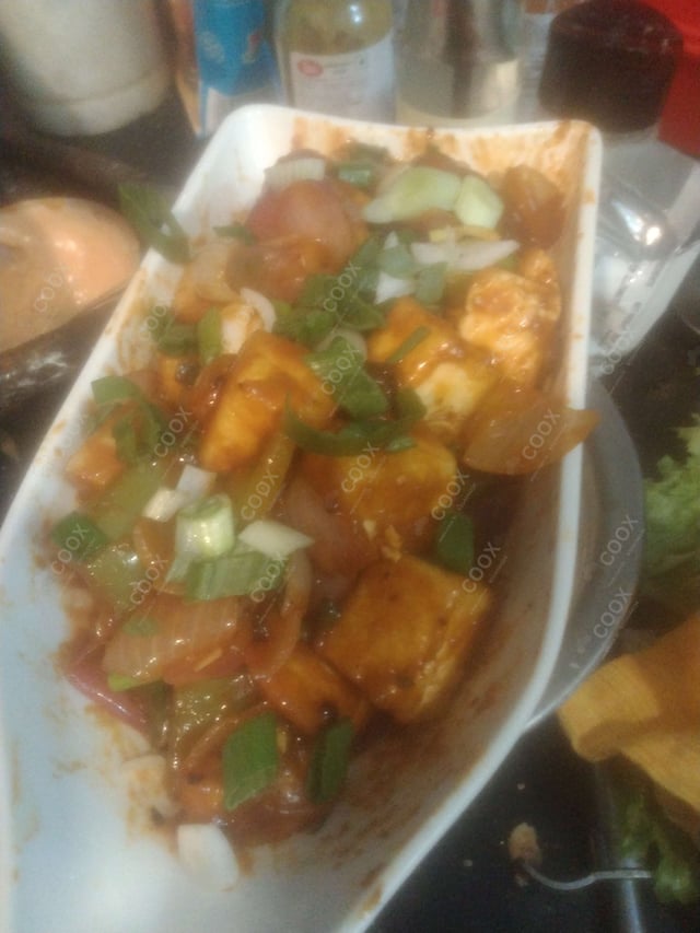 Delicious Chilli Paneer (Dry) prepared by COOX