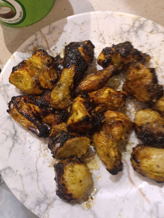 Delicious Tandoori Chicken prepared by COOX