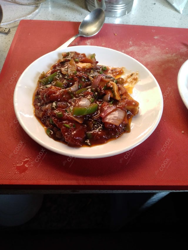 Delicious Chilli Paneer (Dry) prepared by COOX