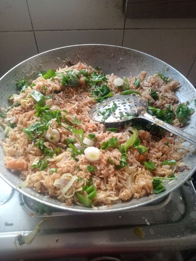 Delicious Veg Fried Rice prepared by COOX