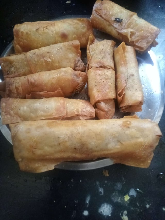 Delicious Veg Spring Rolls prepared by COOX