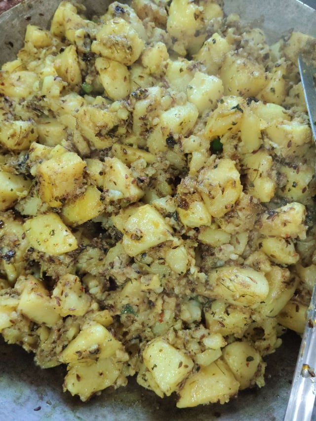 Delicious Jeera Aloo prepared by COOX