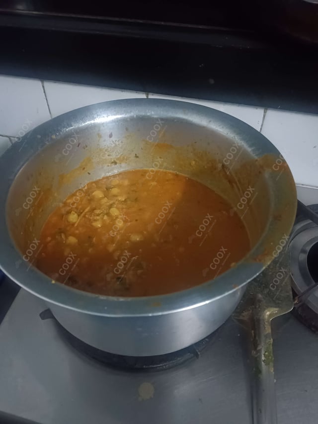 Delicious Chana Bhatura prepared by COOX