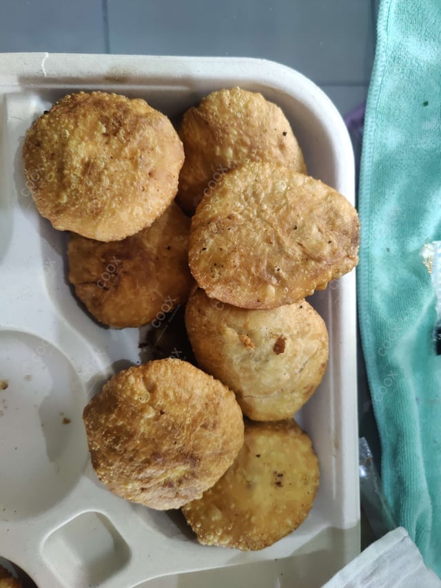 Tasty Kachori cooked by COOX chefs cooks during occasions parties events at home