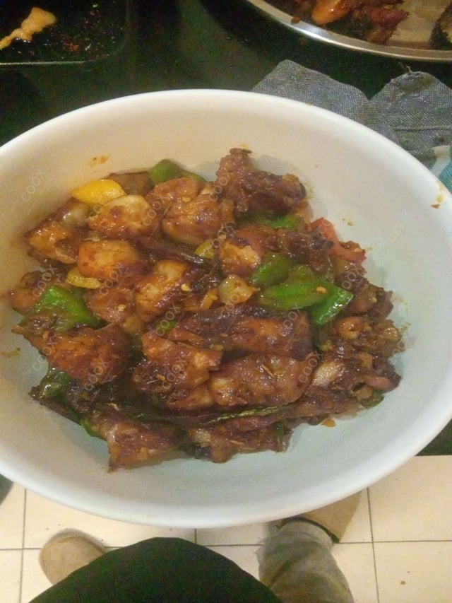 Delicious Kung Pao Chicken prepared by COOX