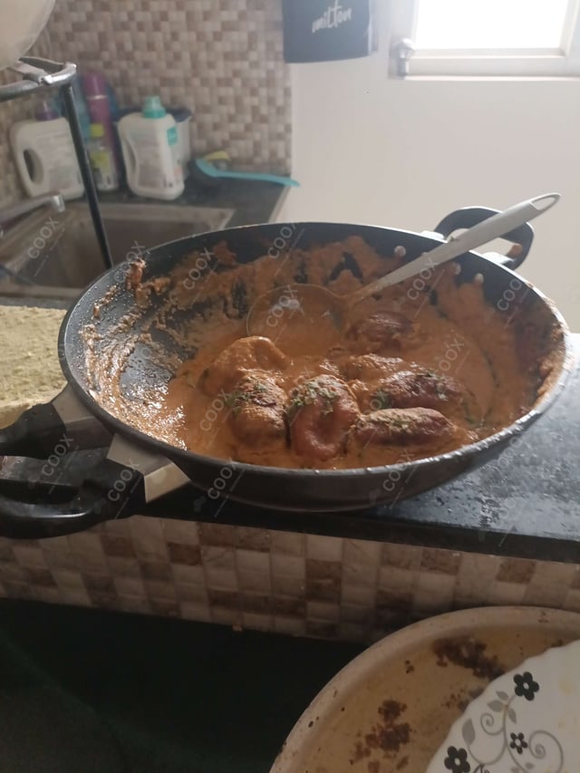 Delicious Malai Kofta (Orange Gravy) prepared by COOX