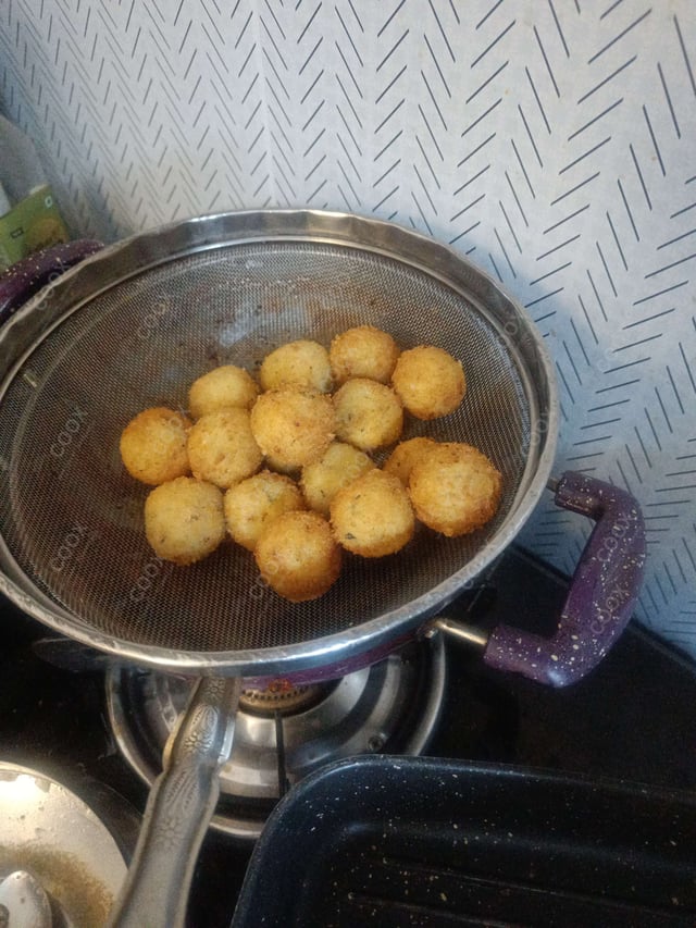 Delicious Fried Cheese Balls prepared by COOX