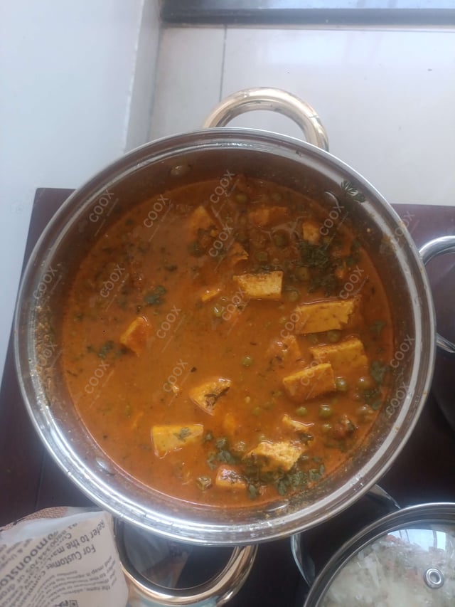 Delicious Matar Paneer prepared by COOX