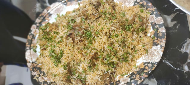 Tasty Mutton Biryani cooked by COOX chefs cooks during occasions parties events at home