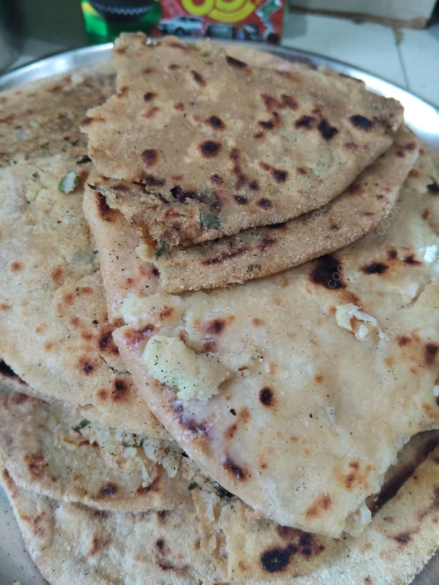 Delicious Stuffed Paranthas prepared by COOX