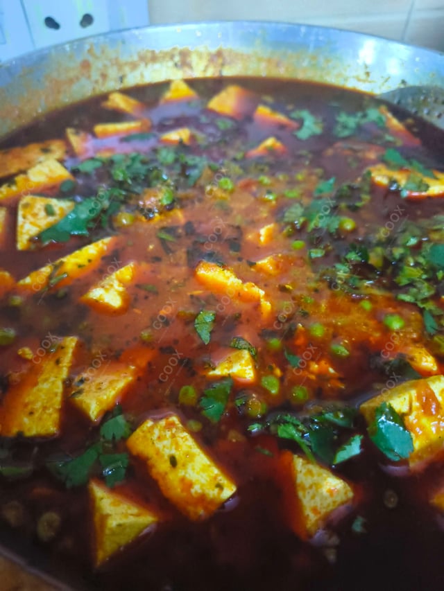 Delicious Matar Paneer prepared by COOX