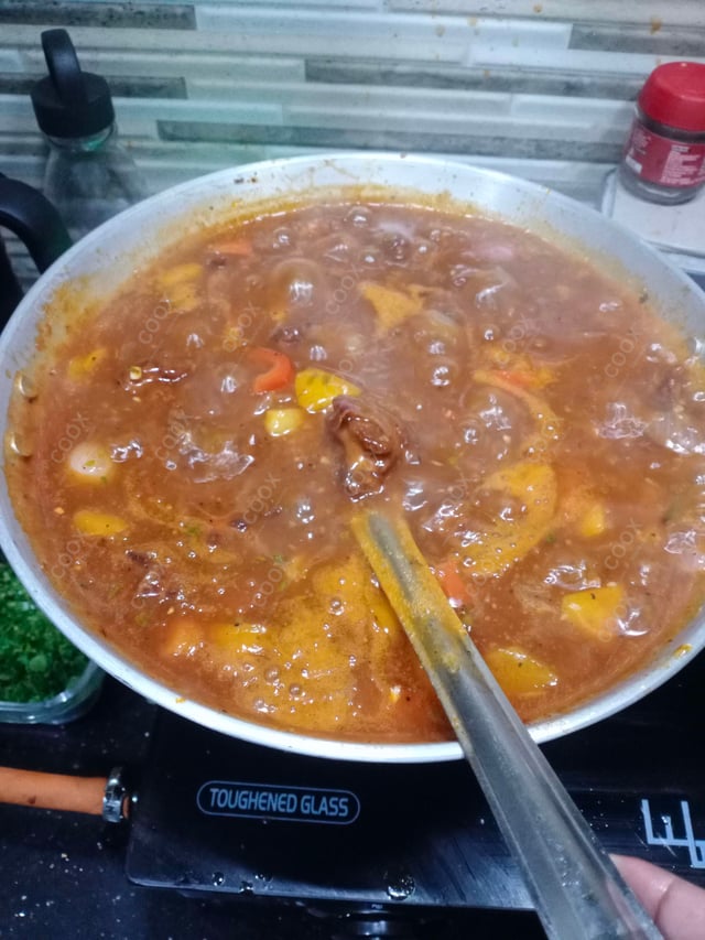 Tasty Chicken In Burnt Garlic Sauce cooked by COOX chefs cooks during occasions parties events at home