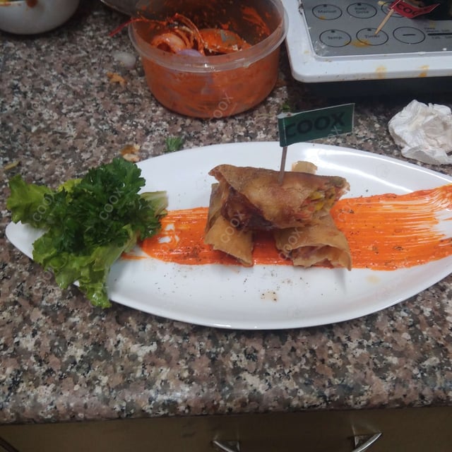 Tasty Veg Spring Rolls cooked by COOX chefs cooks during occasions parties events at home