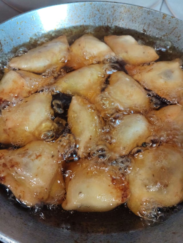 Delicious Mini Samosas prepared by COOX