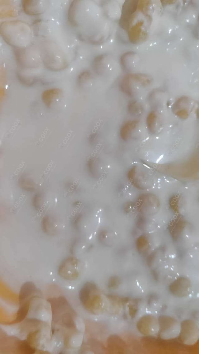 Tasty Boondi Raita cooked by COOX chefs cooks during occasions parties events at home