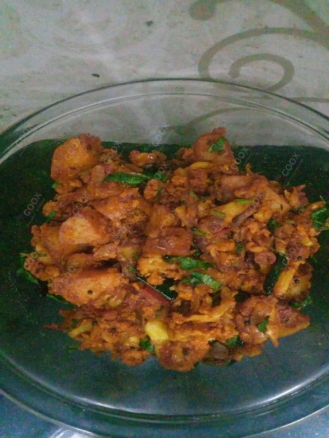 Tasty Aloo Patta Gobhi cooked by COOX chefs cooks during occasions parties events at home