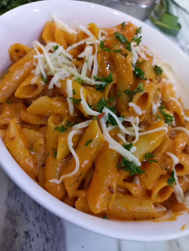 Tasty Pasta in Pink Sauce cooked by COOX chefs cooks during occasions parties events at home