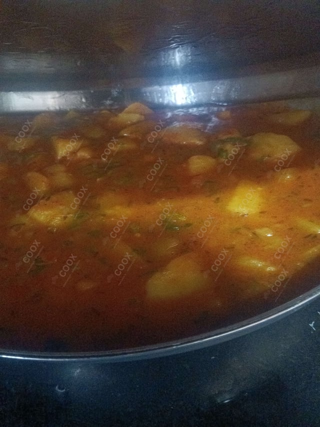 Tasty Aloo Rasedar cooked by COOX chefs cooks during occasions parties events at home