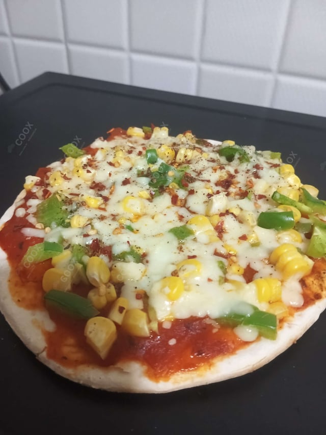 Delicious Veg Pizza prepared by COOX