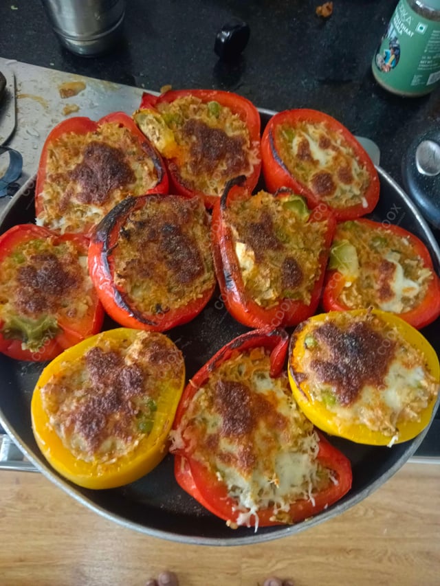 Tasty Stuffed Bell Peppers cooked by COOX chefs cooks during occasions parties events at home