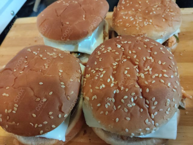 Tasty Chicken Tikka Burgers cooked by COOX chefs cooks during occasions parties events at home