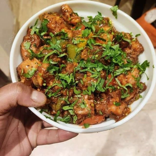 Tasty Chilli  Chicken cooked by COOX chefs cooks during occasions parties events at home