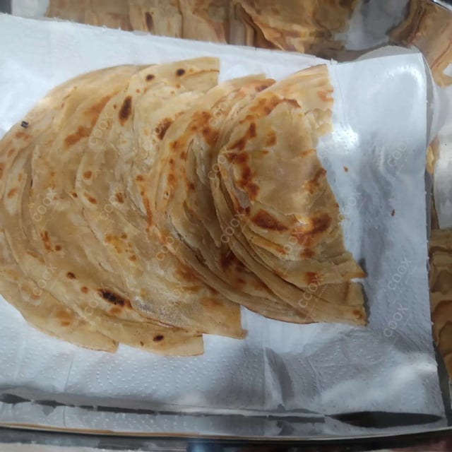Delicious Lachha Parathas prepared by COOX
