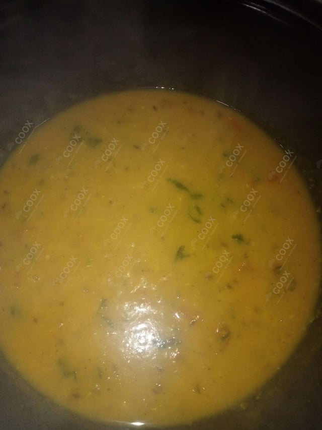 Tasty Urad Dal cooked by COOX chefs cooks during occasions parties events at home