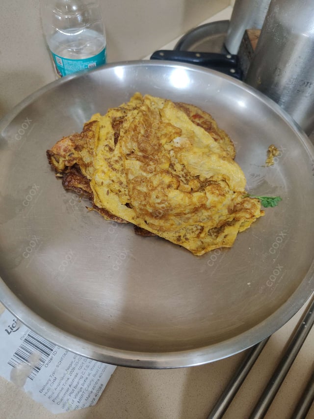 Tasty Masala Omelette cooked by COOX chefs cooks during occasions parties events at home