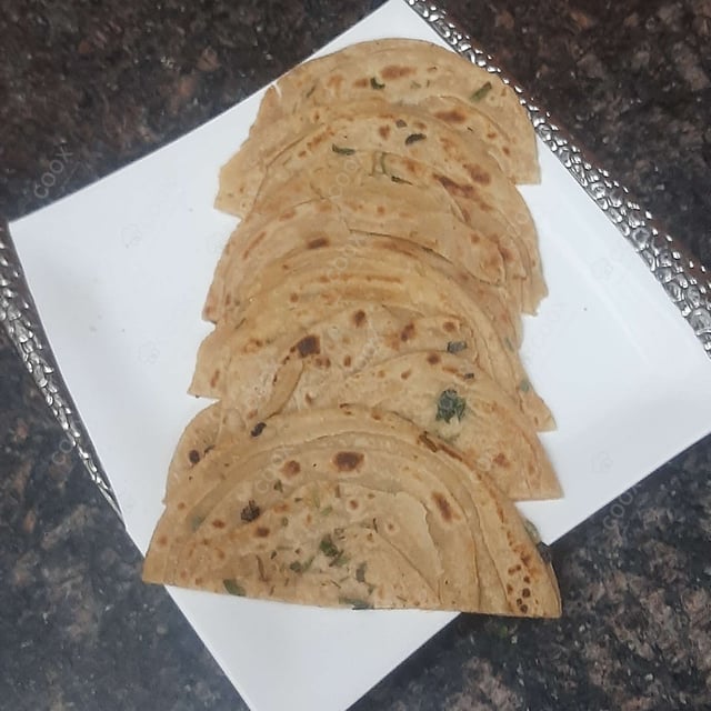 Tasty Lachha Paranthas cooked by COOX chefs cooks during occasions parties events at home