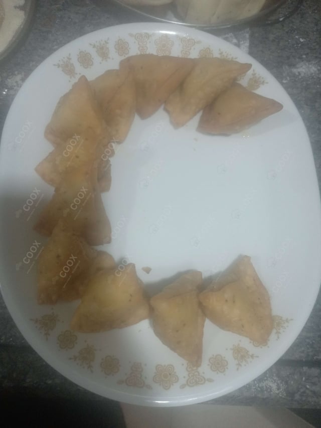 Tasty Dal Samosas cooked by COOX chefs cooks during occasions parties events at home