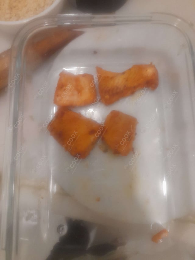 Tasty Baked Fish  cooked by COOX chefs cooks during occasions parties events at home