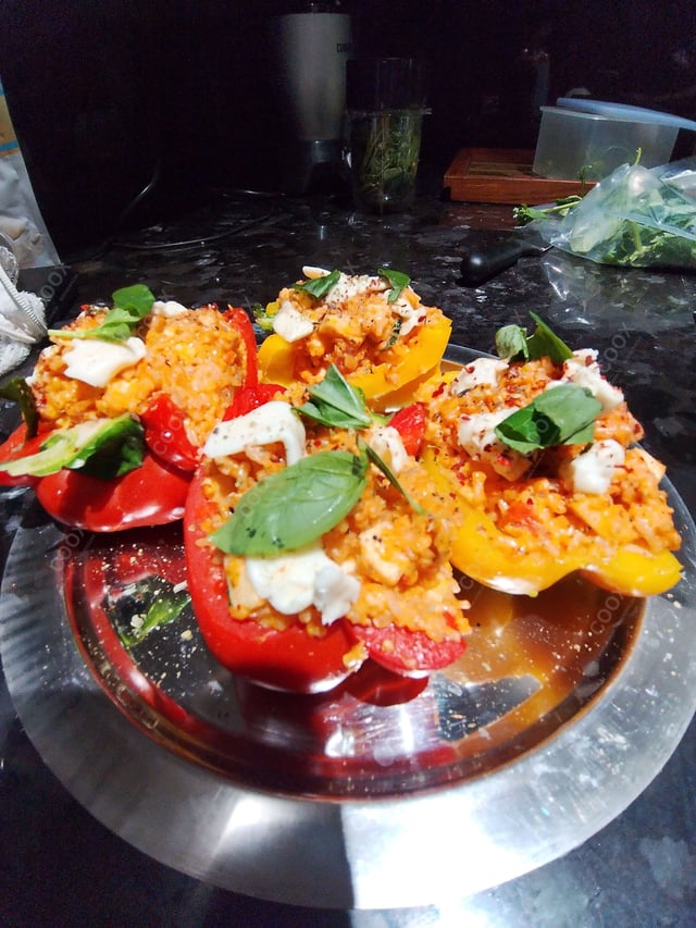 Tasty Stuffed Bell Peppers cooked by COOX chefs cooks during occasions parties events at home