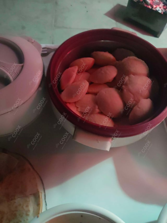 Tasty Rava Idli cooked by COOX chefs cooks during occasions parties events at home