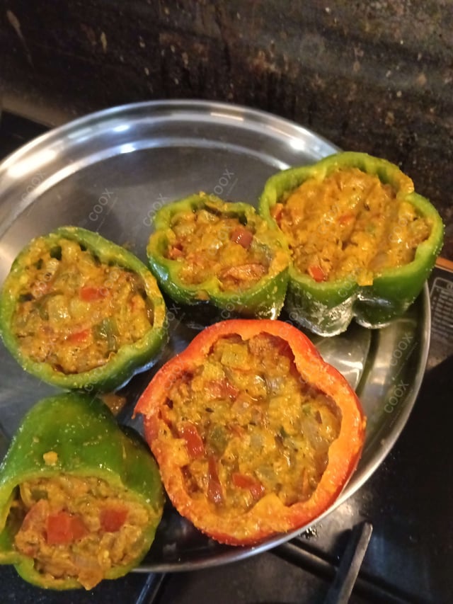 Tasty Stuffed Bell Peppers cooked by COOX chefs cooks during occasions parties events at home