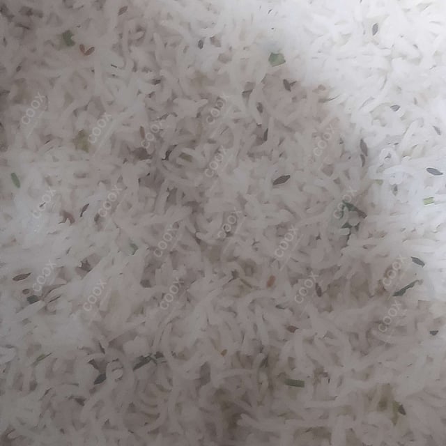 Tasty Jeera Rice cooked by COOX chefs cooks during occasions parties events at home