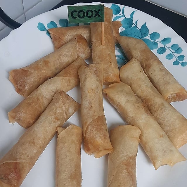 Tasty Veg Spring Rolls cooked by COOX chefs cooks during occasions parties events at home